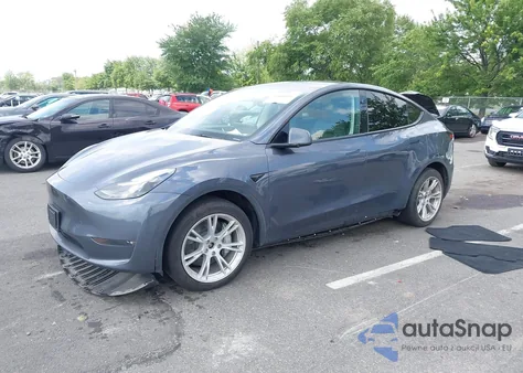 2023 Tesla Model Y z USA, uszkodzony, nr VIN 7SAYGDEE9PF829917